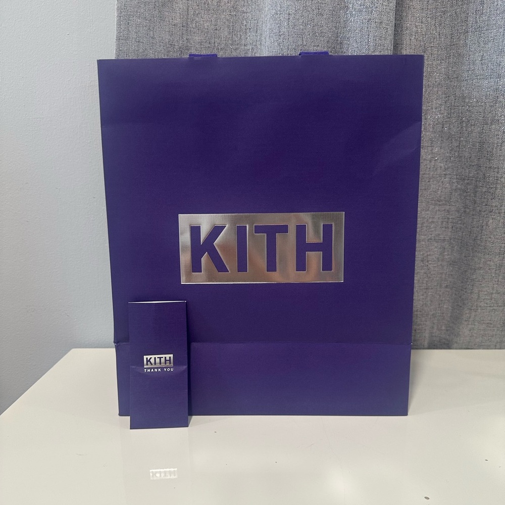 Kith Purple empty paper bag and receipt envelope.
